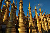 Inle Lake Myanmar. Indein, on the summit of a hill the  Shwe Inn Thein Paya a cluster of hundreds of ancient stupas. Many of them are ruined and overgrown with bushes. 